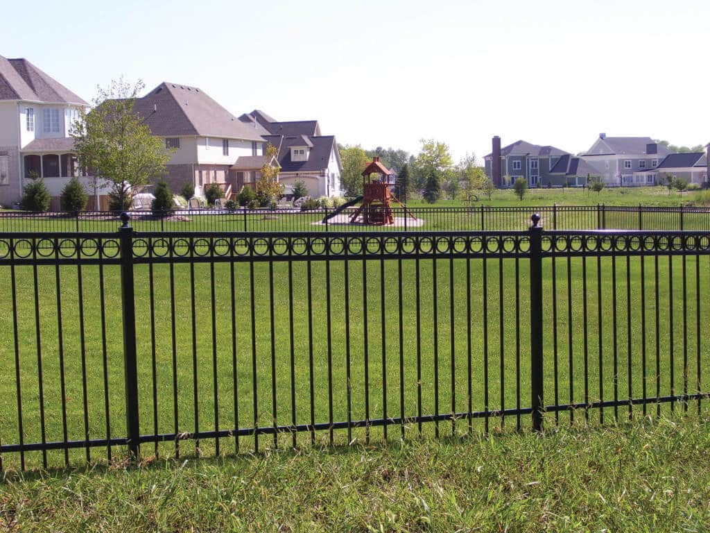 Contact Bullseye Fence Design for your Hamilton County Wrought Iron Fence needs image shows fence on grass