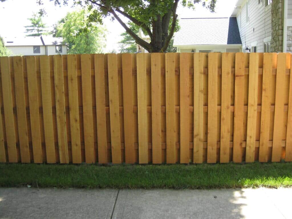 Contact Bullseye Fence Design for Carmel Fence Installation image shows section of wood fence