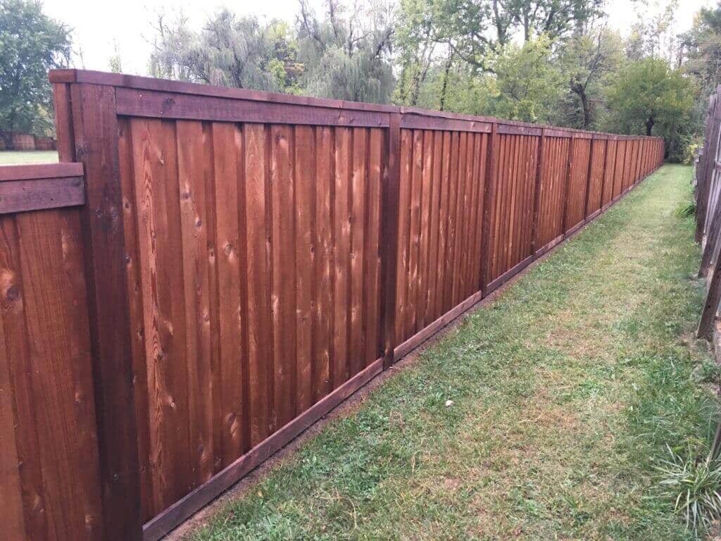 Work with an experienced team at the Bullseye Fence Design Fishers Fence Company image shows brown wooden fence