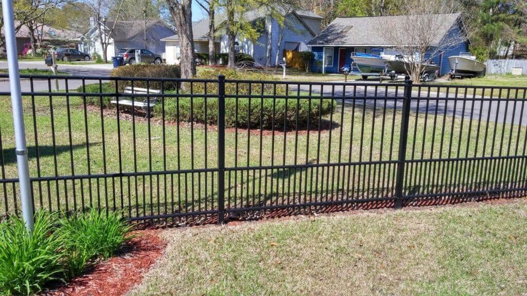 Contact Bullseye Fence Design for professional Westfield Aluminum Fence work image shows fence on yard in neighborhood