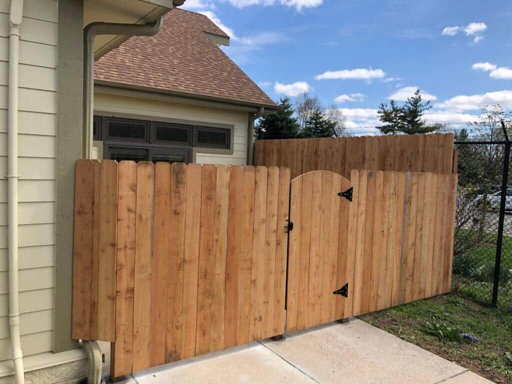 Contact the Bullseye Fence Design Westfield Fence Company image shows fence next to house