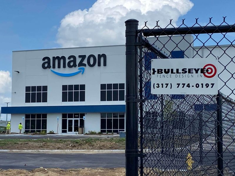 Hamilton County Fence Company Bullseye Fence Design offers commercial fencing solutions image shows fence in front of Amazon building